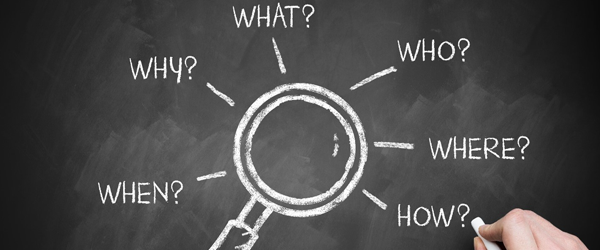 Drawing of magnifying glass with the following words around it: when, why, what, who, where, how.